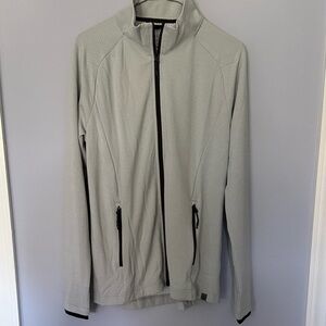 Women's Light Gray Zip Jacket with pockets and black accents CNN